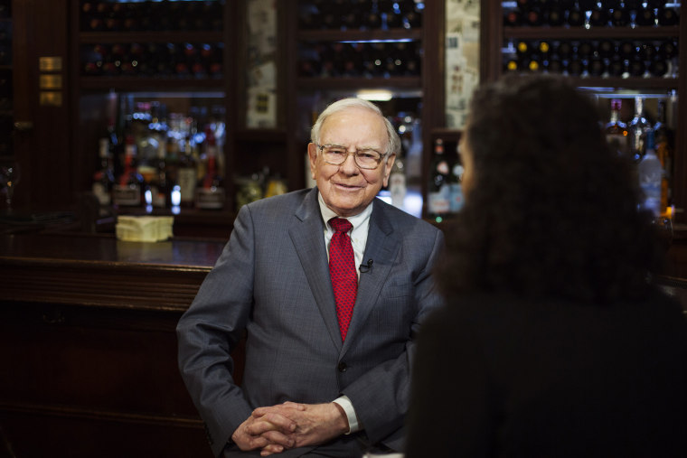 Investor Warren Buffett poses for a portrait during an interview after a luncheon to benefit the Glide Foundation of San Francisco in New York