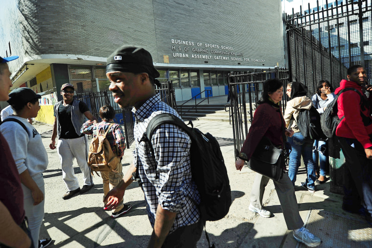 High school students leave the High School of Graphic Communication Arts in New York on April, 30, 2013