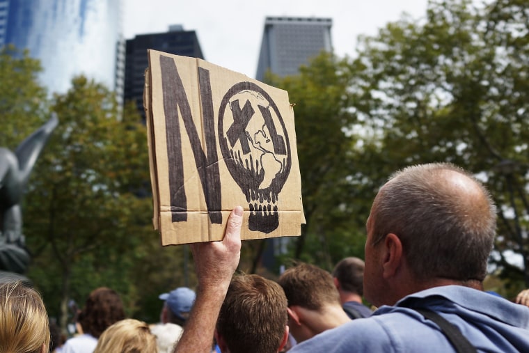 Anti-fracking and Keystone XL pipeline activists demonstrate in lower Manhattan on September 21, 2013 in New York City