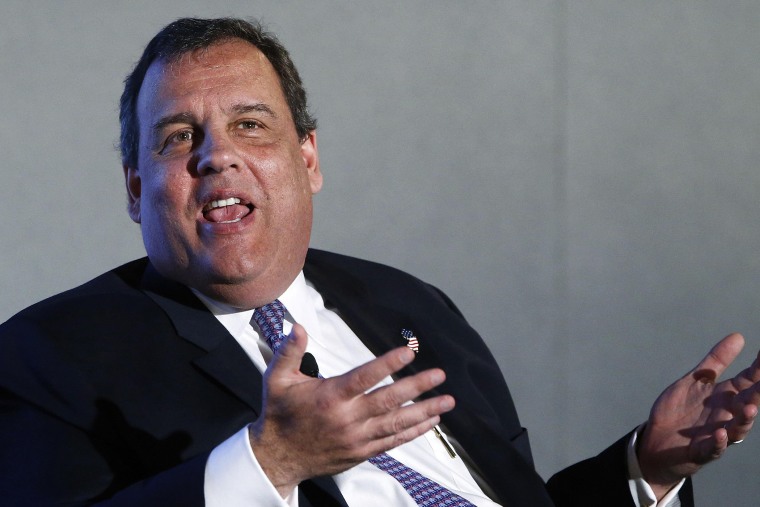 New Jersey Governor Chris Christie (R-NJ) gestures during an onstage interview at the 2014 Peterson Foundation Fiscal Summit in Washington on May 14, 2014.