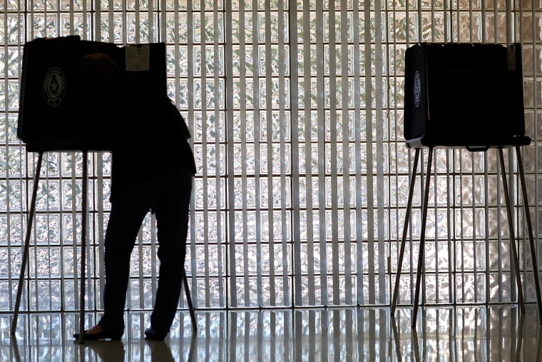 A voter casts her ballot on Nov. 6, 2012 in Mansfield, Texas.