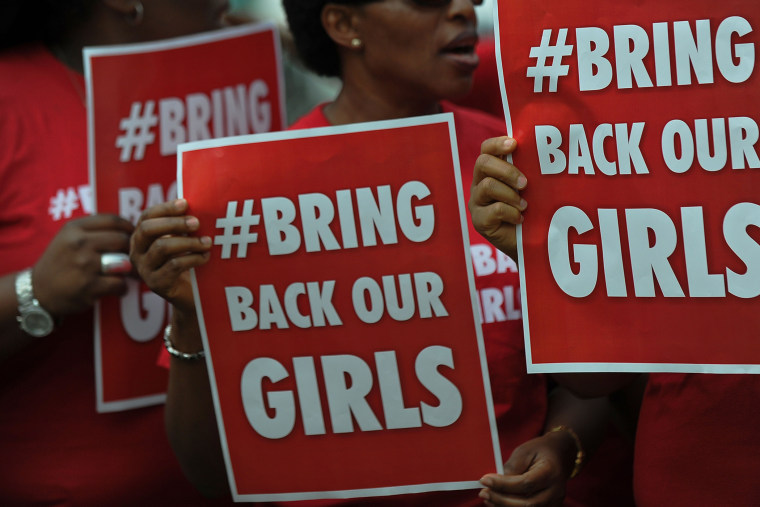 Nigerian women living in Kenya demonstrate to press for the release of Nigerian school girls kidnapped in nothern Nigeria by members of the Boko Haram, on May 16, 2014 in Nairobi.