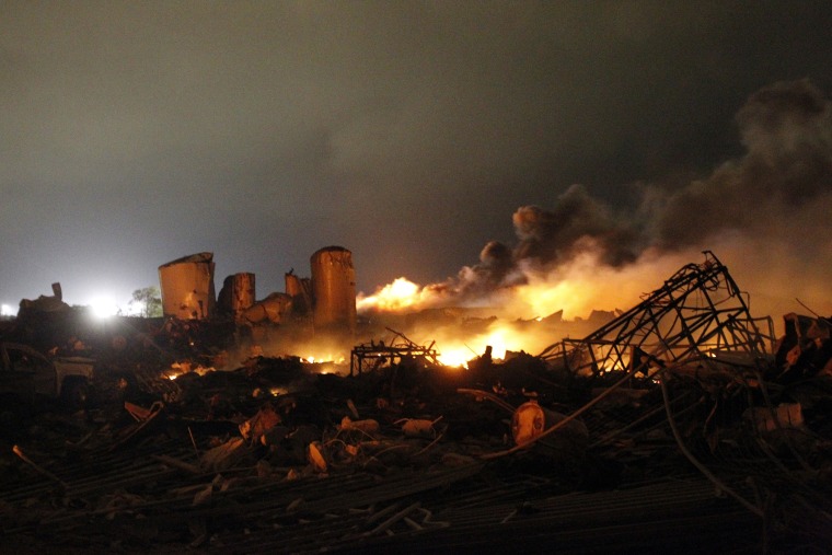 The remains of a fertilizer plant burn after an explosion at the plant in the town of West, near Waco, Texas early April 18, 2013.