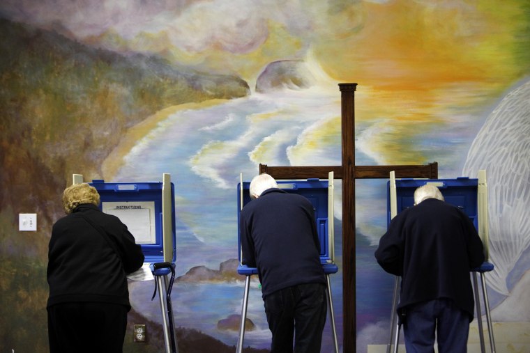 Voters cast ballots at the Fellowship of Christ church in Cary, N.C. on Election Day, Nov. 6, 2012.