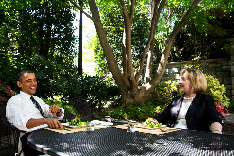 U.S. President Barack Obama has lunch Hillary Rodham Clinton on the patio outside the Oval Office, July 29, 2013.
