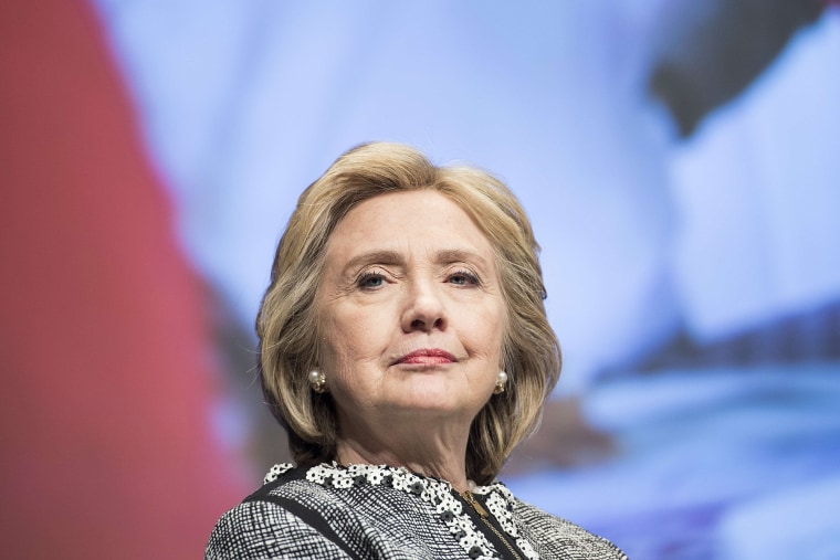 Hillary Clinton waits to speak at the World Bank in Washington, DC, May 14, 2014.