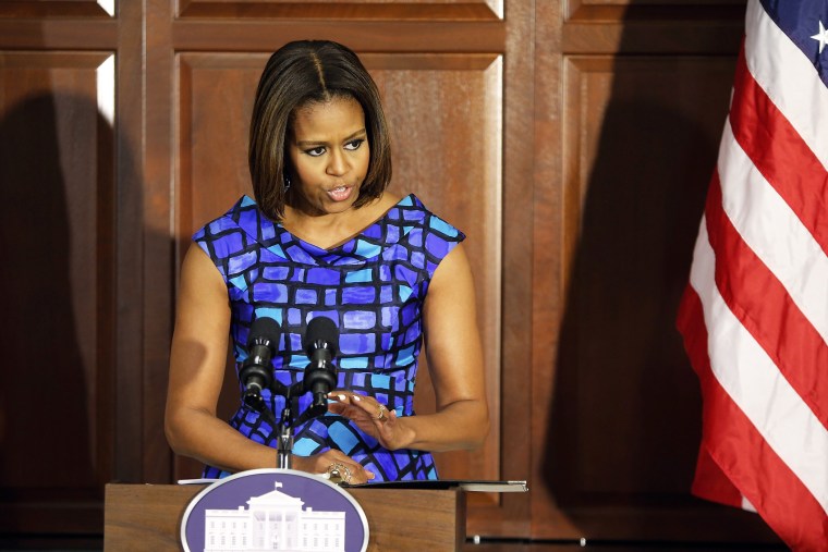 U.S. first lady Michelle Obama addresses a discussion with school nutrition experts about issues in school food programs at the Eisenhower Executive Office Building in Washington, May 27, 2014.