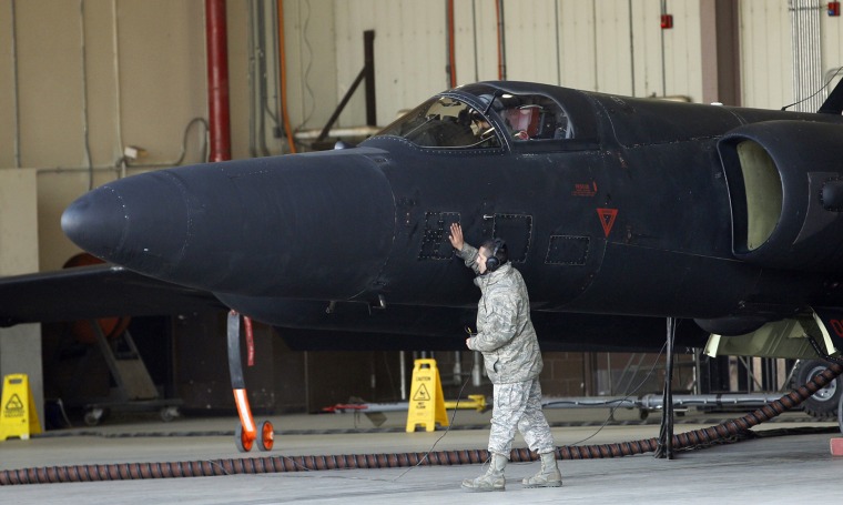 In this photo taken Feb. 16, 2012, a U.S. soldier checks a U.S. Air Force U-2 spy plane before takeoff during a training flight at the U.S. airbase in Osan, South Korea.