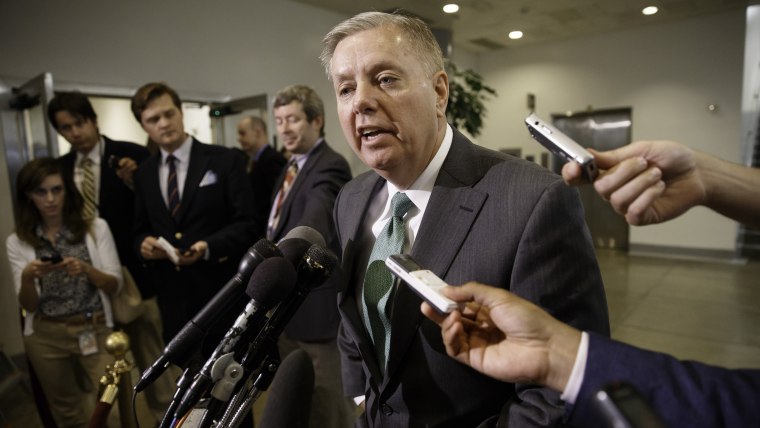 Sen. Lindsey Graham speaks to reporters on Capitol Hill in Washington, Wednesday, June 4, 2014.