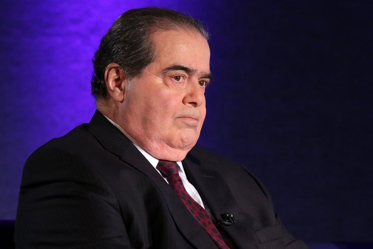 Supreme Court Justice Antonin Scalia waits for the beginning of the taping of \"The Kalb Report\" April 17, 2014 at the National Press Club in Washington, DC.