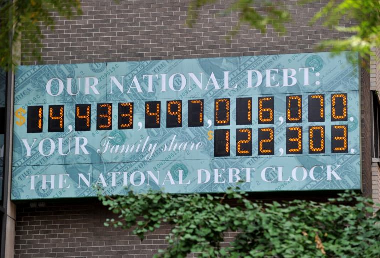The National Debt Clock, a billboard-size digital display showing the increasing US debt, on Sixth Avenue August 1, 2011 in New York.