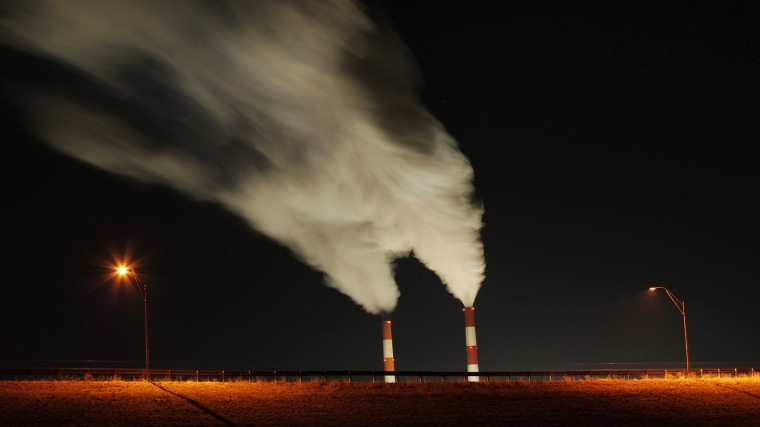 In this Jan. 19, 2012 file photo, smoke rises in this time exposure image from the stacks of the La Cygne Generating Station coal-fired power plant in La Cygne, Kan.