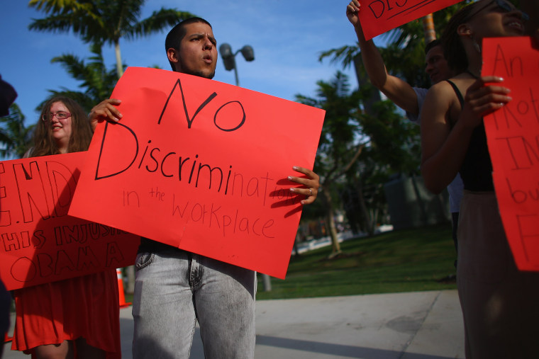 LGBT Activists Protest Workplace Discrimination Outside Obama Fundraiser