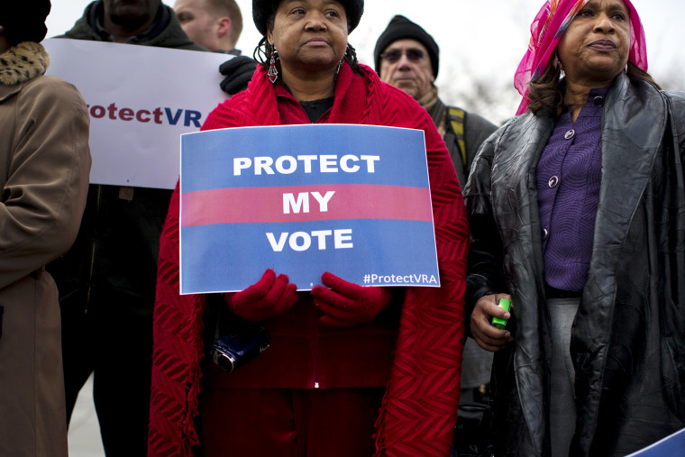 People wait in line outside the Supreme Court in Washington, Wednesday, Feb. 27, 2013, to listen to oral arguments in the Shelby County, Ala., v. Holder voting rights case.