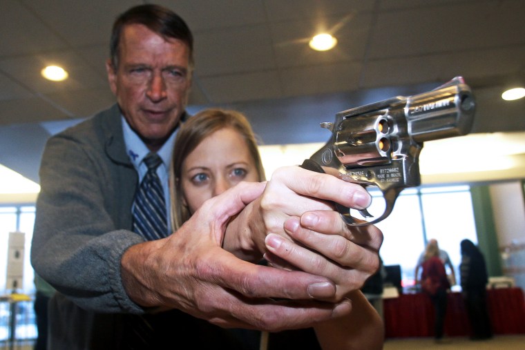 A fourth grade teacher receives instruction during a concealed weapons training for teachers in West Valley City, Utah.