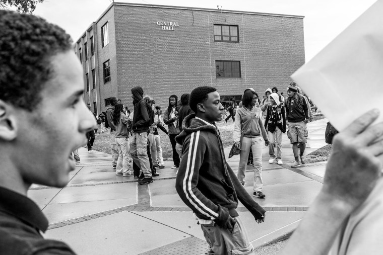 A group of students outside of Normandy High School just moments after the bell rang at the end of school in Wellston, St. Louis County, Mo.