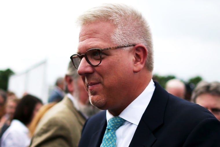 Glenn Beck walks through the crown after speaking to supporters at a Tea Party rally in front of the U.S. Capitol, June 17, 2013 in Washington, DC.