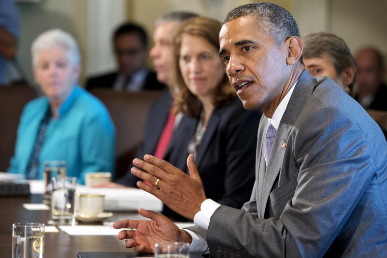 President Barack Obama speaks to the media during a meeting with his cabinet members, July 1, 2014.