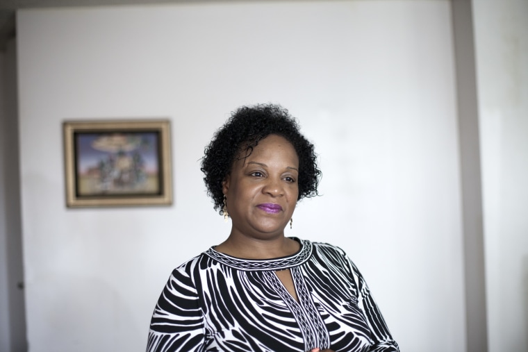 Tracey Richardson, 45, in her home in Bronzeville, Chicago.