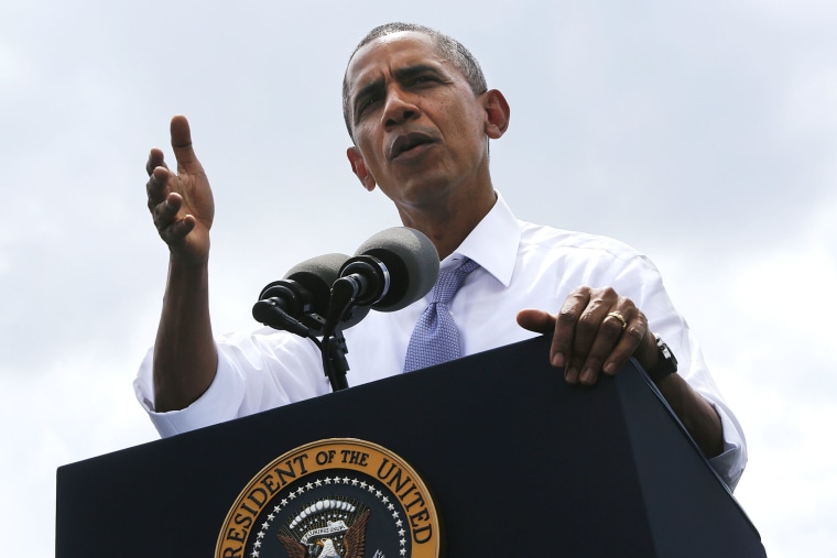 U.S. President Barack Obama delivers remarks at the Georgetown Waterfront Park in Washington, July 1, 2014.