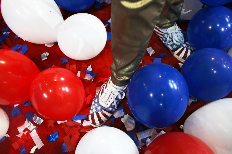 A person stands in balloons during the 2012 Republican National Convention in Tampa, Florida.