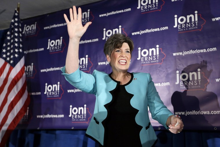 State Sen. Joni Ernst waves to supporters at a primary election night rally, June 3, 2014, in Des Moines, Iowa.