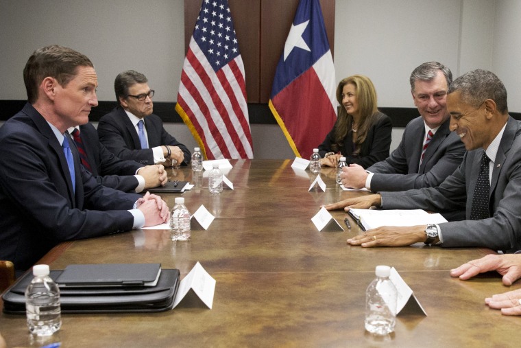 President Barack Obama attends a meeting about the border and immigration with local elected officials and faith leaders at DalFort Fueling in Dallas, Wednesday, July 9, 2014.
