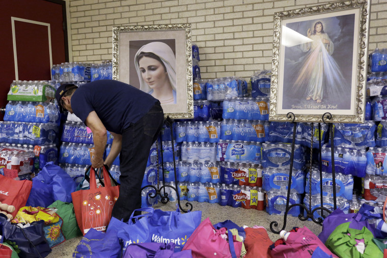 Donated items for undocumented immigrant families are arranged at the Sacred Heart Catholic Church in McAllen, Texas on June 20, 2014.