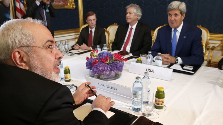 Iran's Foreign Minister Javad Zarif (L) holds a bilateral meeting with US Secretary of State John Kerry (R) on the second straight day of talks over Tehran's nuclear program in Vienna, on July 14, 2014.