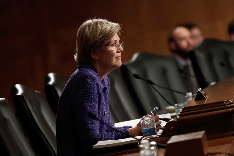 Sen. Elizabeth Warren (D-MA) listens during a hearing, Nov. 12, 2013 in Washington, D.C.