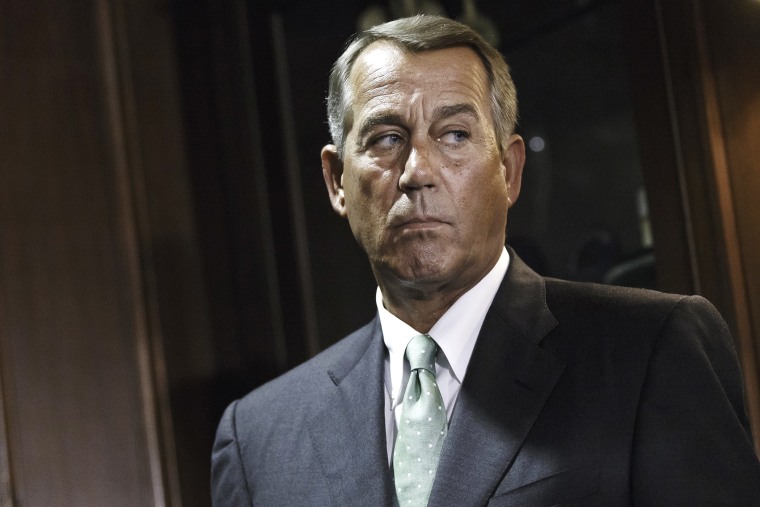 House Speaker John Boehner of Ohio meets with reporters in Washington, July 15, 2014.