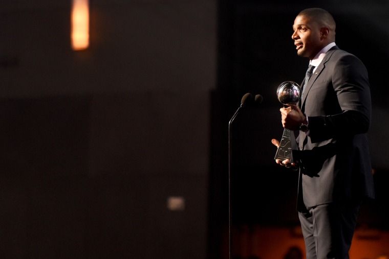 NFL player Michael Sam accepts the Arthur Ashe Courage Award onstage during The 2014 ESPYS at Nokia Theatre L.A. Live on July 16, 2014 in Los Angeles, Calif.