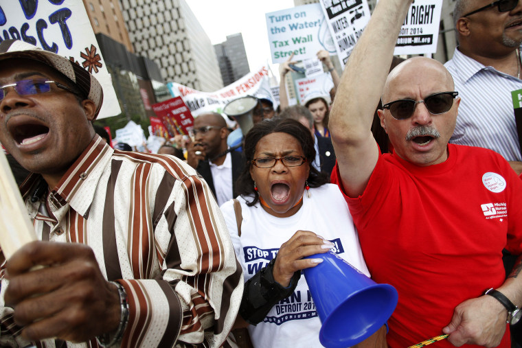 Image: Protest Advocate Water Access Is Basic Right, After City Of Detroit Starts Cutting Service