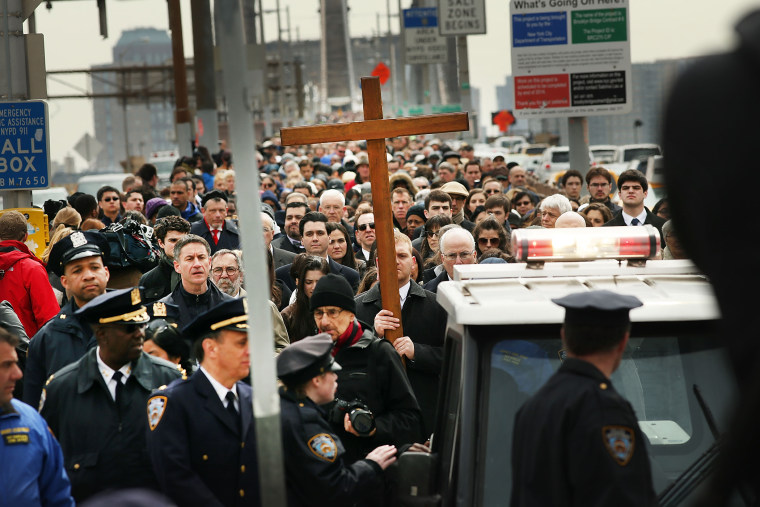 Cardinal Dolan Takes Part In Way Of The Cross Procession Across The Brooklyn Bridge