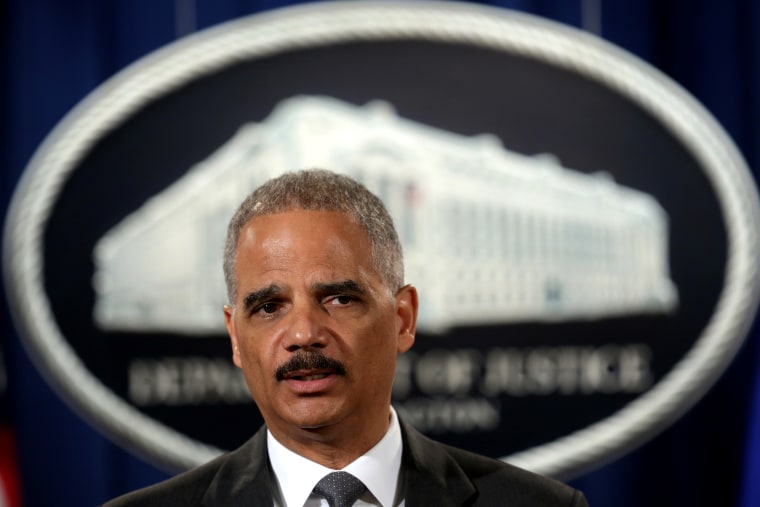 Attorney General Eric Holder at the Justice Department July 14, 2014.