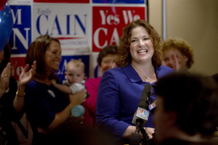 Democratic candidate for the 2nd Congressional District Emily Cain smiles as the crowd cheers after she was declared the winner in the primary election in Bangor, Maine, June 10, 2014.