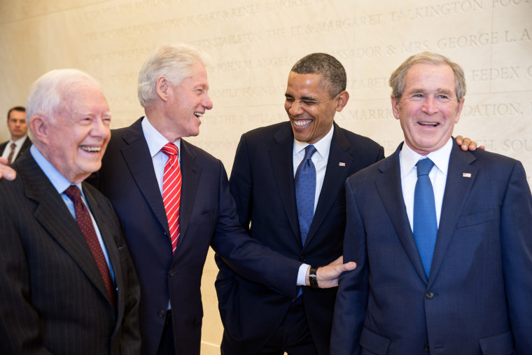 President Barack Obama laughs with former Presidents Jimmy Carter, Bill Clinton, and George W. Bush on the campus of Southern Methodist University in Dallas, Texas, April 25, 2013.