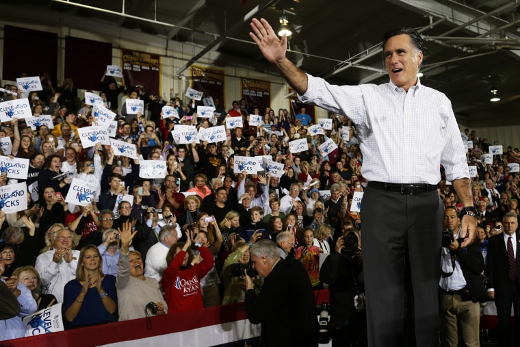 Republican presidential candidate, former Massachusetts Gov. Mitt Romney waves to supporters as he takes the stage at a campaign stop at Avon Lake High School in Avon Lake, Ohio, Oct. 29, 2012.