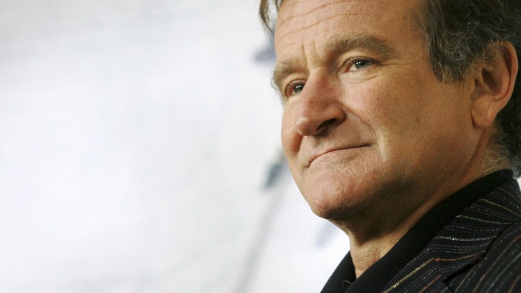 U.S. actor Robin Williams poses for photographers during a photocall in Rome