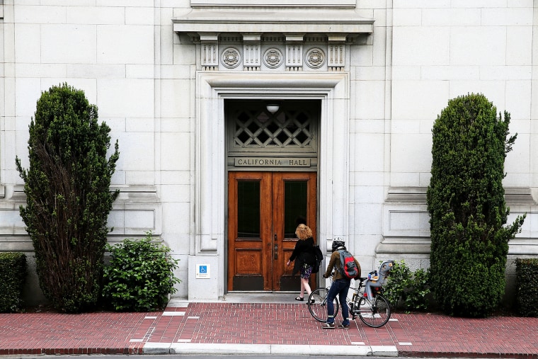 People enter California Hall on the UC Berkeley campus on May 22, 2014 in Berkeley, California.