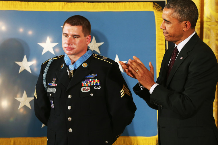 U.S. President Barack Obama applauds after presenting the Medal of Honor to U.S. Army Sgt. Kyle J. White during a ceremony in the East Room of the White House May 13, 2014 in Washington, DC.