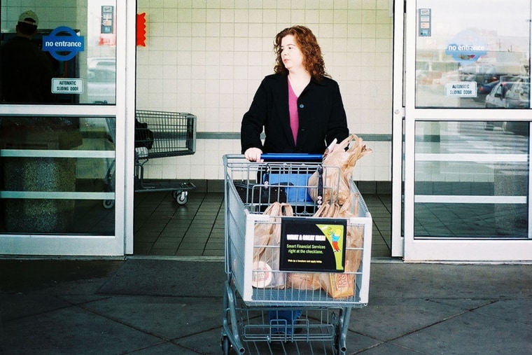 A woman exits a Kroger supermarket in Detroit.