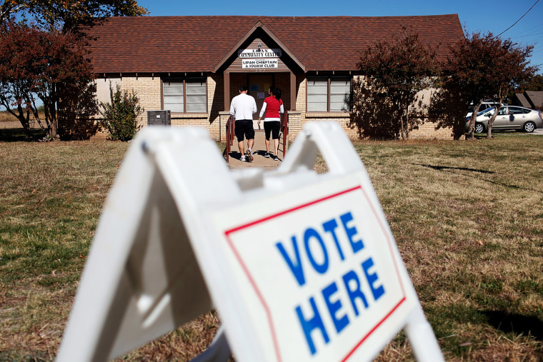 Voters exit a polling location after voting on November 6, 2012 in Lipan, Texas.