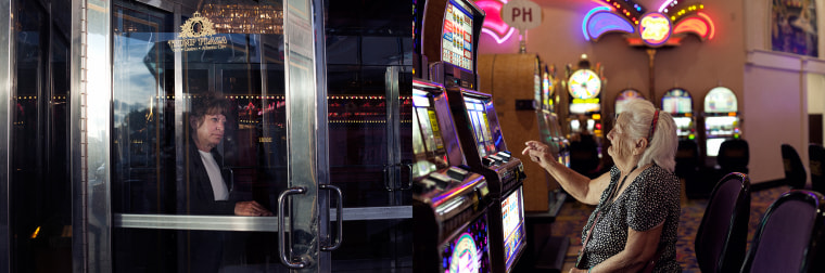 (left) Debbie Huey, has worked at Trump Plaza for 30 years as a hotel cashier supervisor while (right) a woman plays slots as the Showboat casino during its final hour of operation on Aug. 31, 2014.