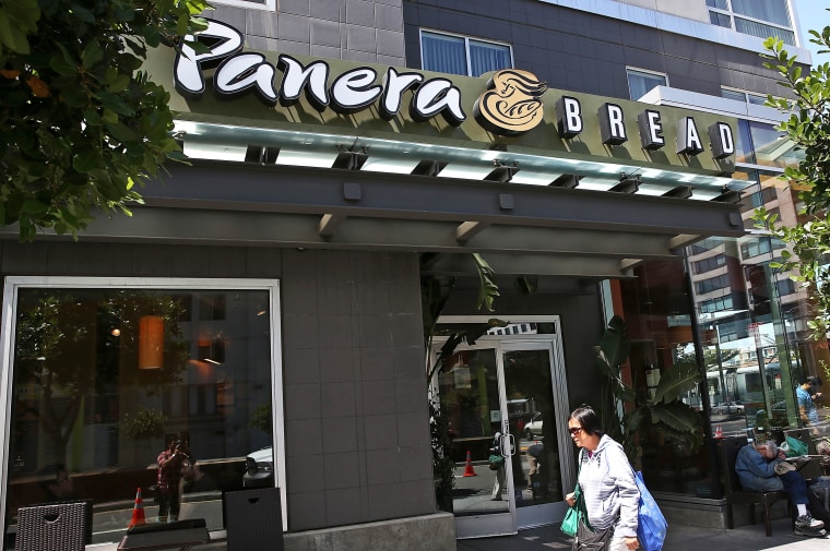 A pedestrian walks by a Panera Bread restaurant on June 3, 2014 in San Francisco, California.
