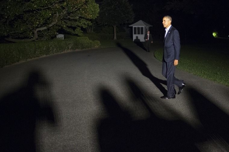 U.S. President Barack Obama walks from Marine One to the White House on September 5, 2014 in Washington, DC. Photo by Joshua Roberts/Getty.