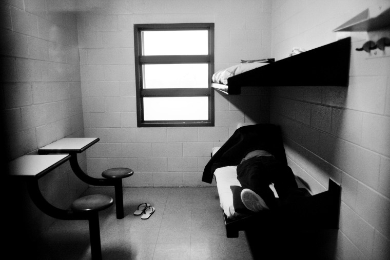 A teen in his cell at a youth prison in Chicago, Ill.
