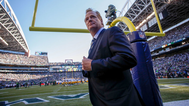 NFL commissioner Roger Goodell walks the sidelines prior to the game between the Seattle Seahawks and the Green Bay Packers at CenturyLink Field on September 4, 2014 in Seattle, Washington.  Photo by Otto Greule Jr/Getty.