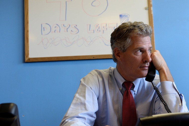 Scott Brown works the phone banks at the New Hampshire GOP Salem headquarters on Sept. 17, 2014 in Salem, N.H. (Photo by Darren McCollester/Getty)