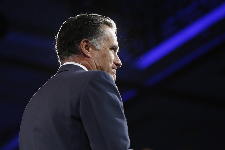 Former U.S. presidential candidate Mitt Romney takes the stage at CPAC in National Harbor, Maryland, March 15, 2013.